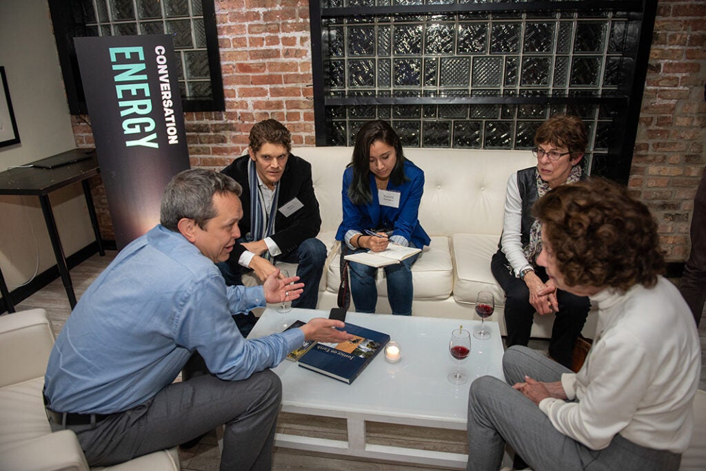 Earthjustice attorney Shannon Fisk (left) speaks with supporters at a Justice Partners summit.