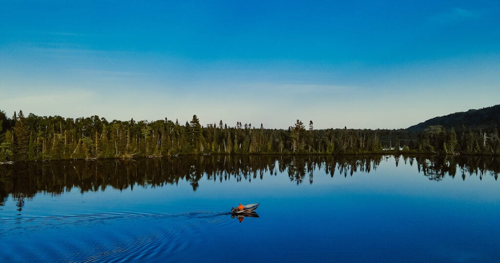 Bob Gravelle, Bay Mills tribal citizen, going out on Spectacle Lake in Bay Mills to fish.